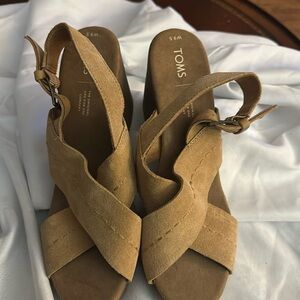 Tom’s, platform suede sandals, never worn out side! Nice comfortable platform.